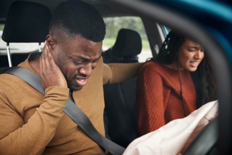 two individuals who have suffered injuries after being in a car accident